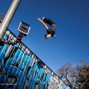 Staff member Christian doing a flip in midair